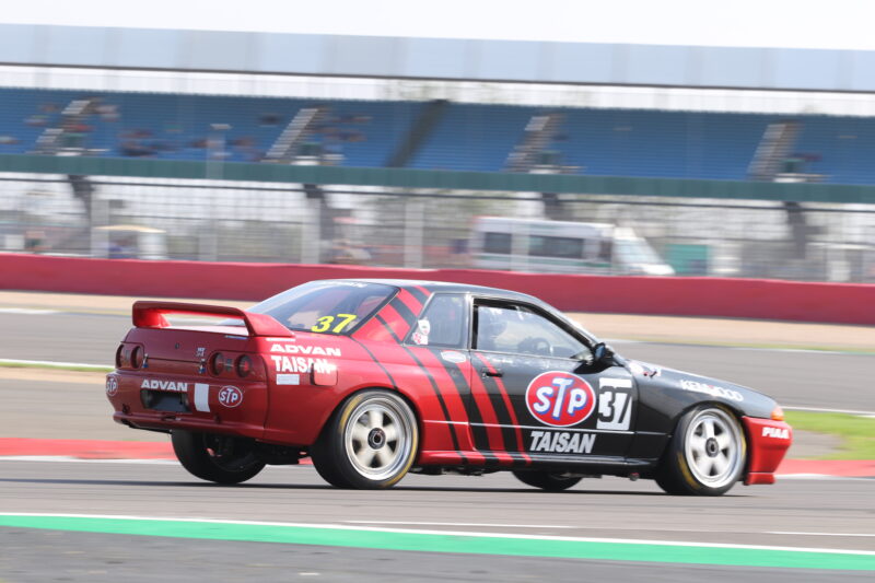 Silverstone Classic, Silverstone, Classic, motoring, automotive, car and classic, carandclassic.com, classic motorsport, austin, mini, austin healey, healey, jaguar, mercedes, cooper, bmw, ford, rs turbo, diana rs turbo, ferrari, porsche, classic motorsport event, silverstone classic 2022, classic, retro, high performance,