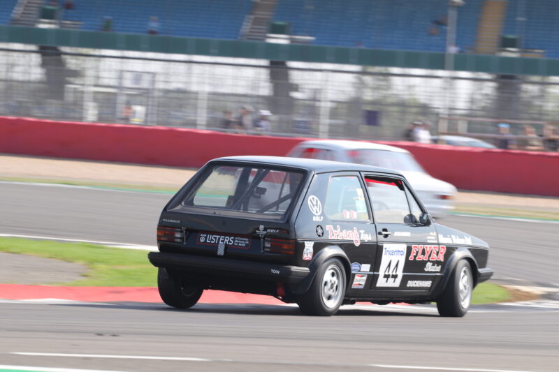 Silverstone Classic, Silverstone, Classic, motoring, automotive, car and classic, carandclassic.com, classic motorsport, austin, mini, austin healey, healey, jaguar, mercedes, cooper, bmw, ford, rs turbo, diana rs turbo, ferrari, porsche, classic motorsport event, silverstone classic 2022, classic, retro, high performance,