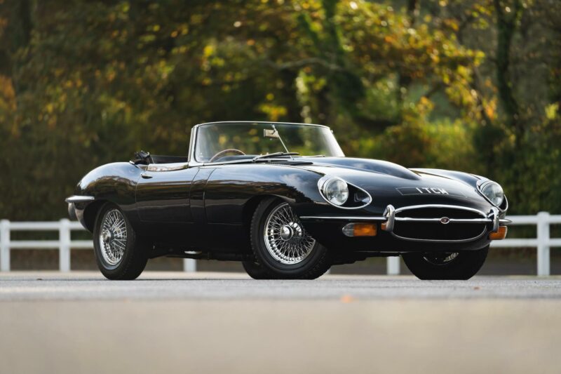 Black Jaguar E Type with a blurred background
